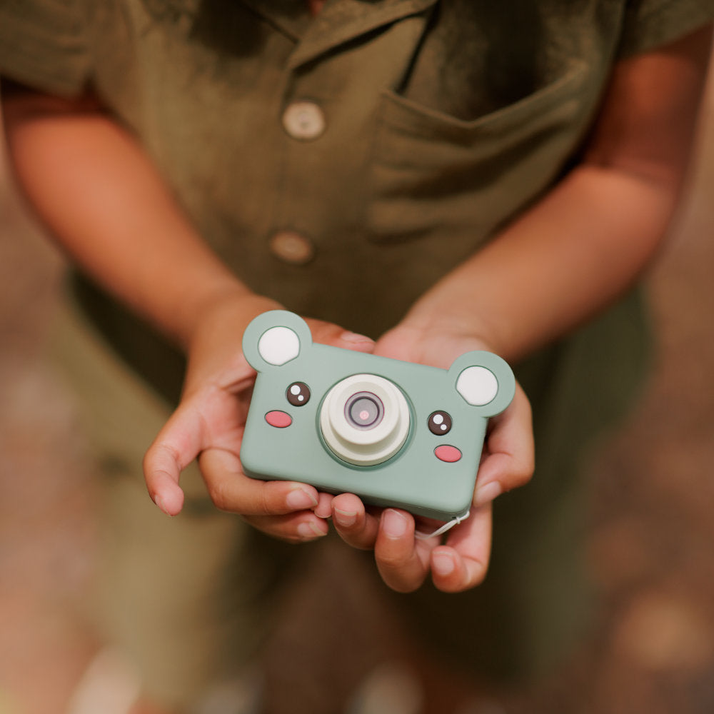 boy hands holding kids camera