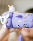 kidamento model v iris the unicorn lifestyle camcorder in hand with stickers